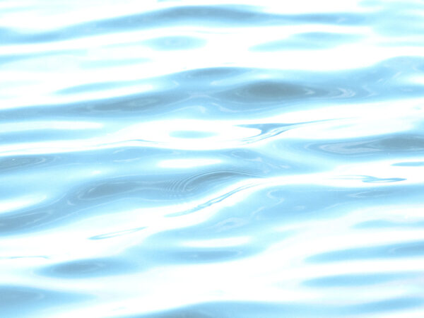 imagen de Fotomural superficie agua reflejo sol en decoracionesenvinilo.com