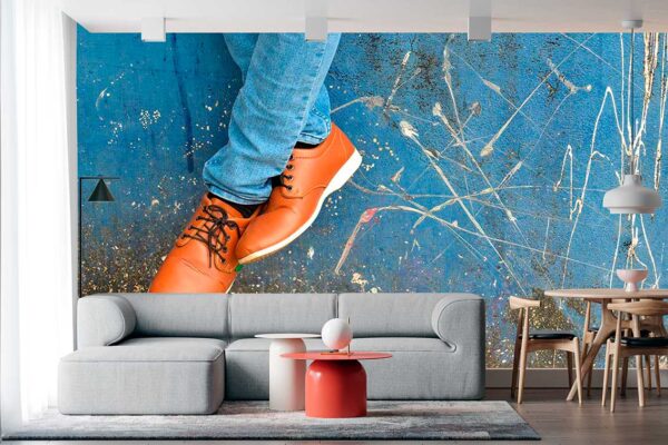 imagen de Fotomural hombre sentado en muro en decoracionesenvinilo.com